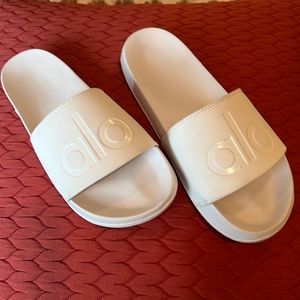 Size 9. White ALO slides